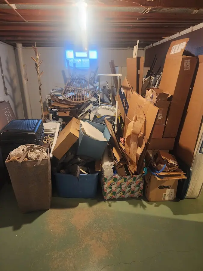 Roll-off dumpster container at job site for 8 Yard Dumpster Rental in Belterra